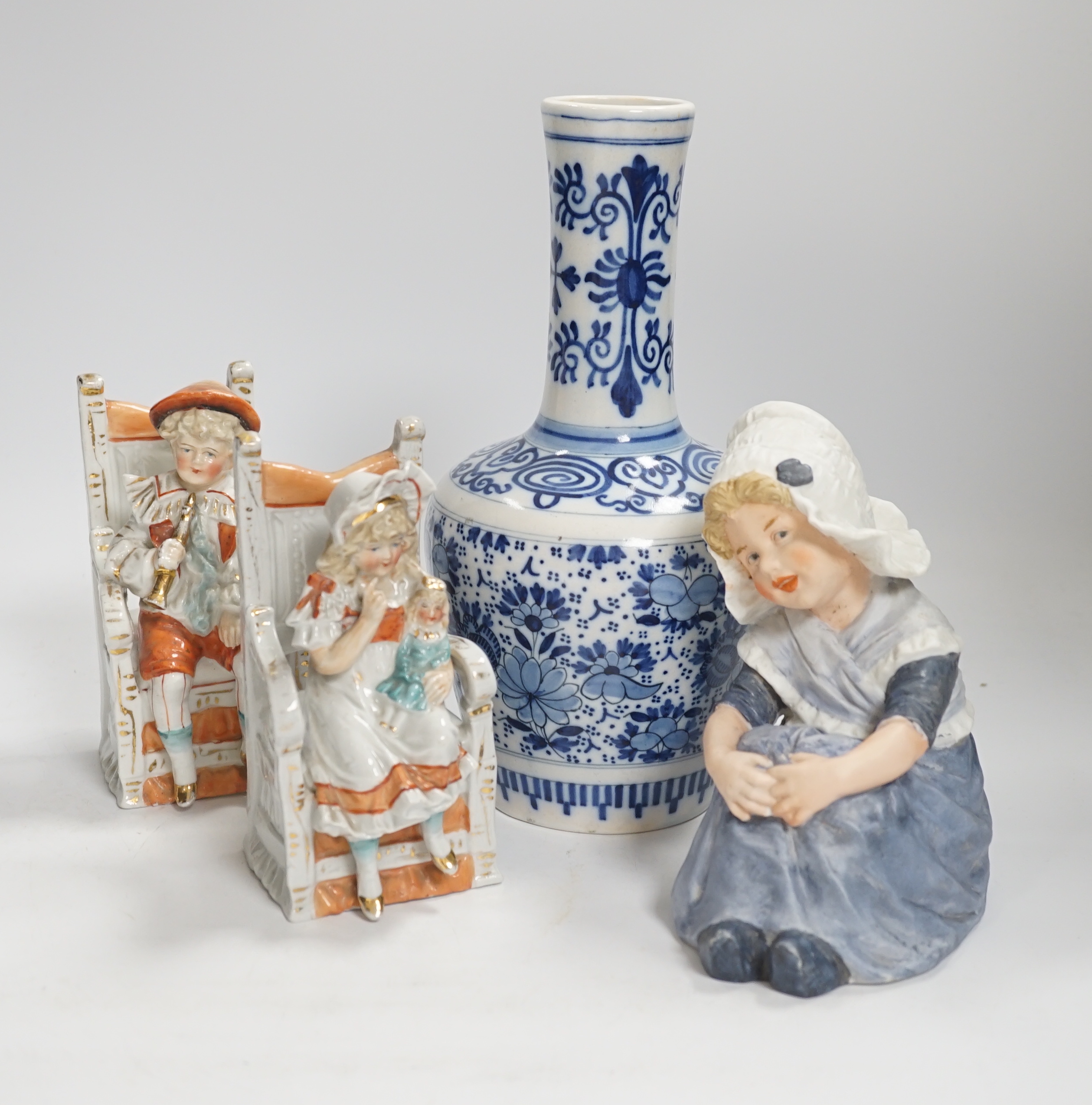 Twelve German and English porcelain items, mainly figures by Ernst Bohn, etc. a Staffordshire cup and saucer, blue and white vase, etc. vase 24cm